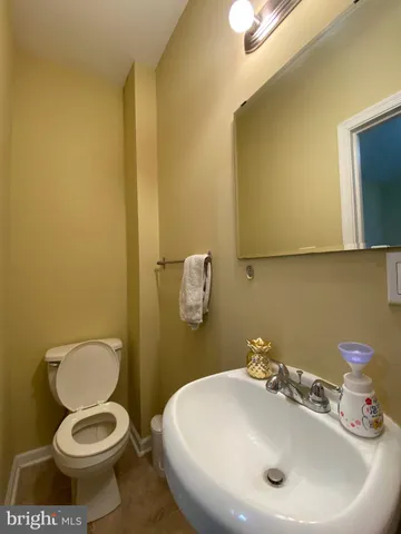 a bathroom with a sink and a toilet