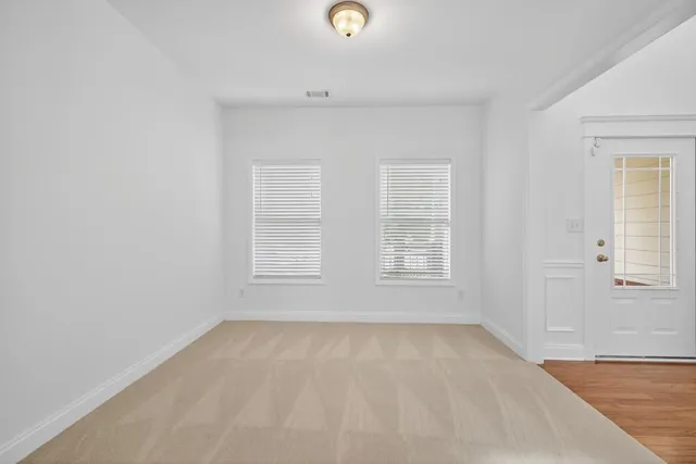 an empty room with windows