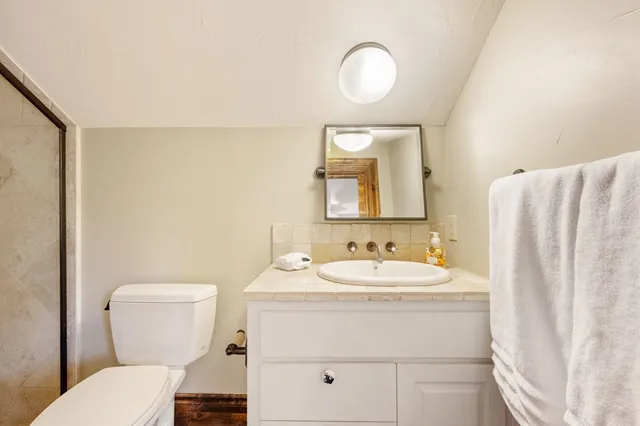 a view of two chairs in a room