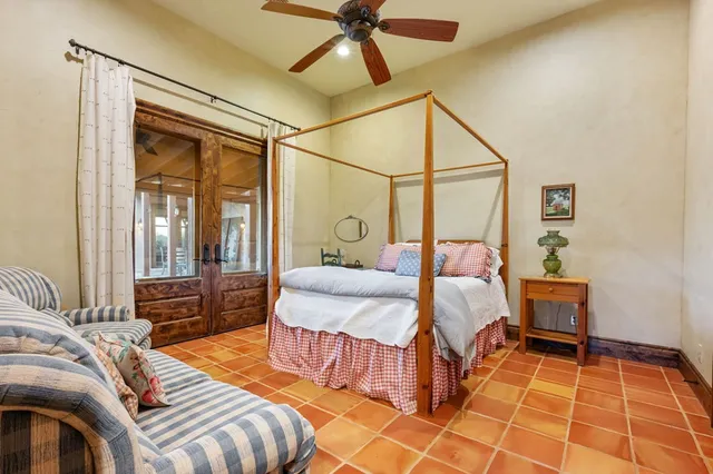 a view of a house with swimming pool and sitting area