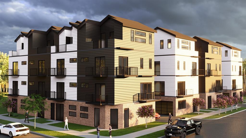 711 East 7th Street Dallas, TX 75203 - Photo 8 of 9 a front view of a residential apartment building with a yard