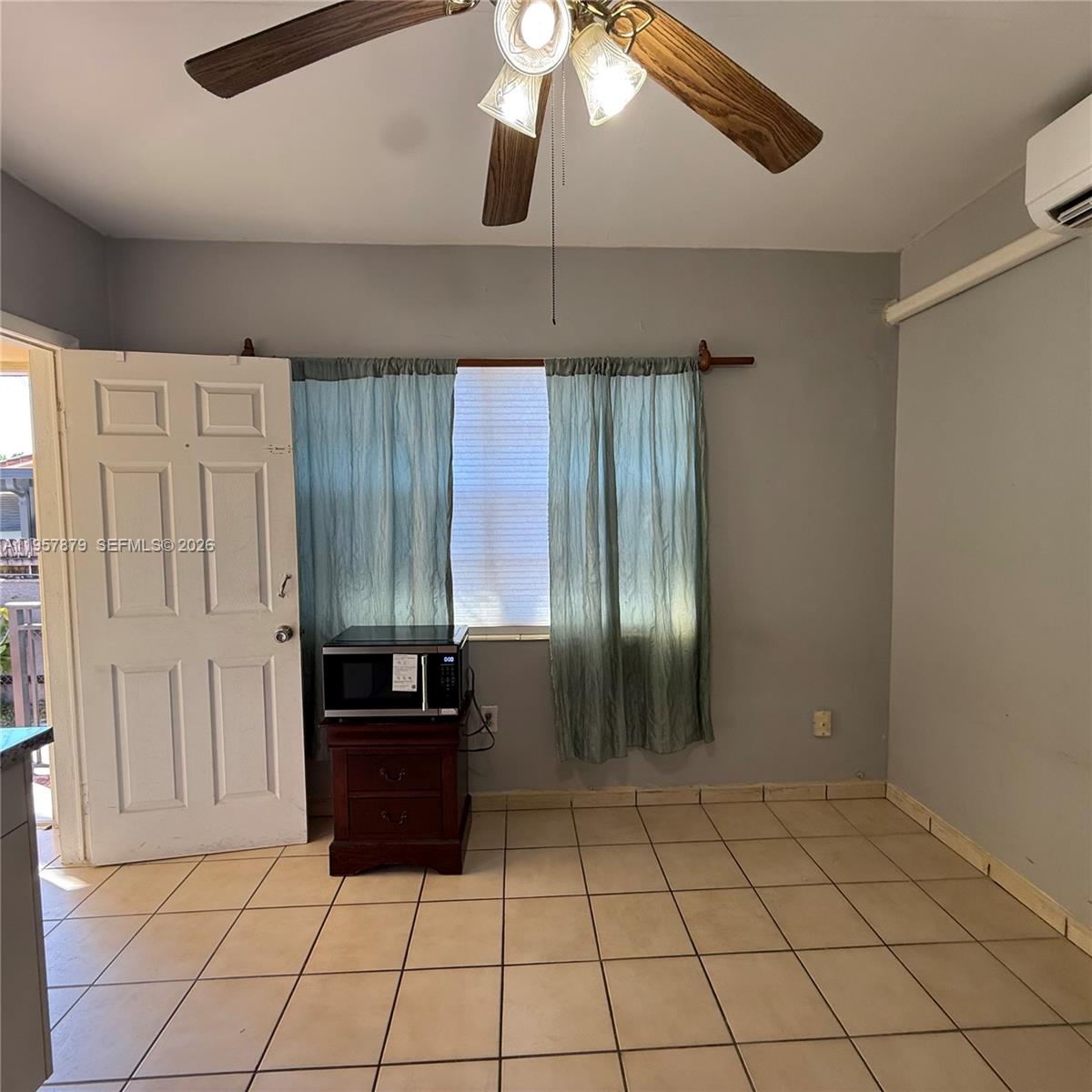 275 West 16th Street Hialeah, FL 33010 - Photo 6 of 17 a view of an empty room and window