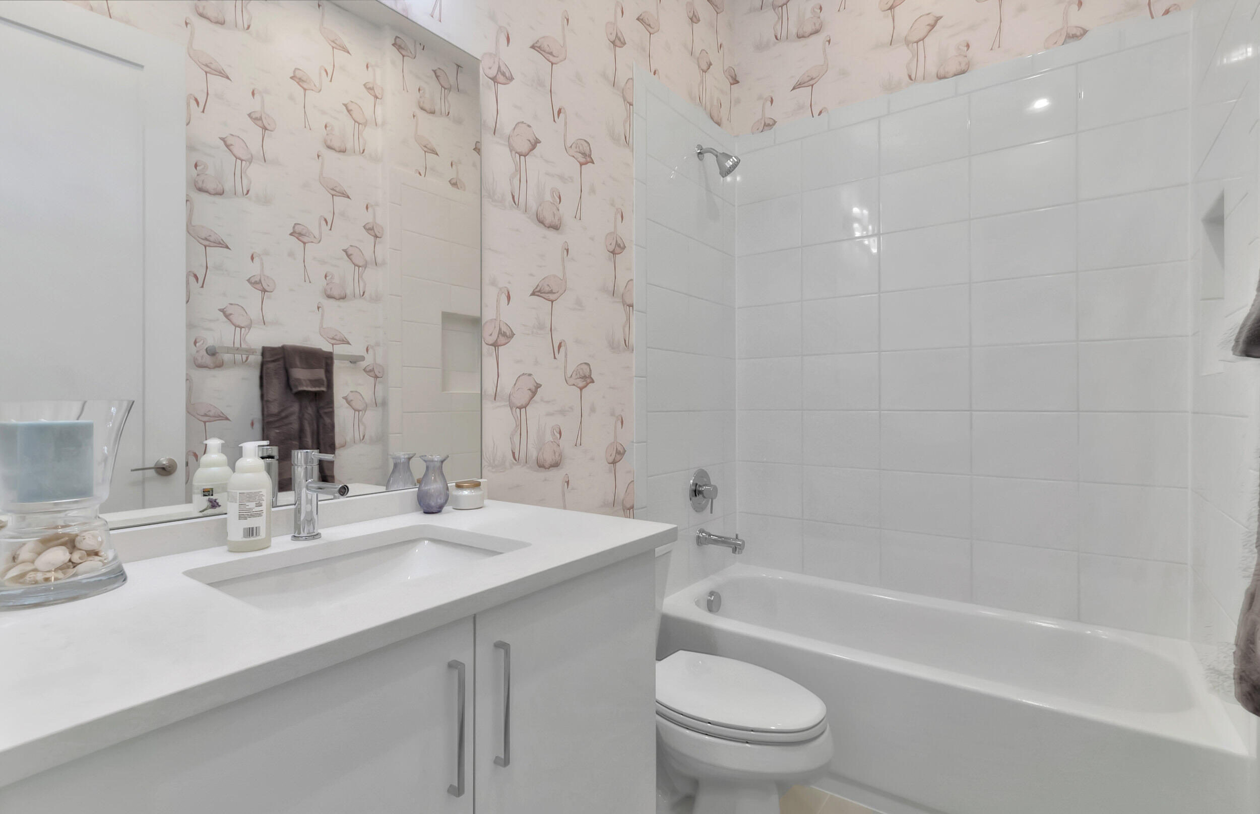 17118 Aquavera Way Boca Raton, FL 33496 - Photo 12 of 53 a bathroom with a sink a toilet and bathtub