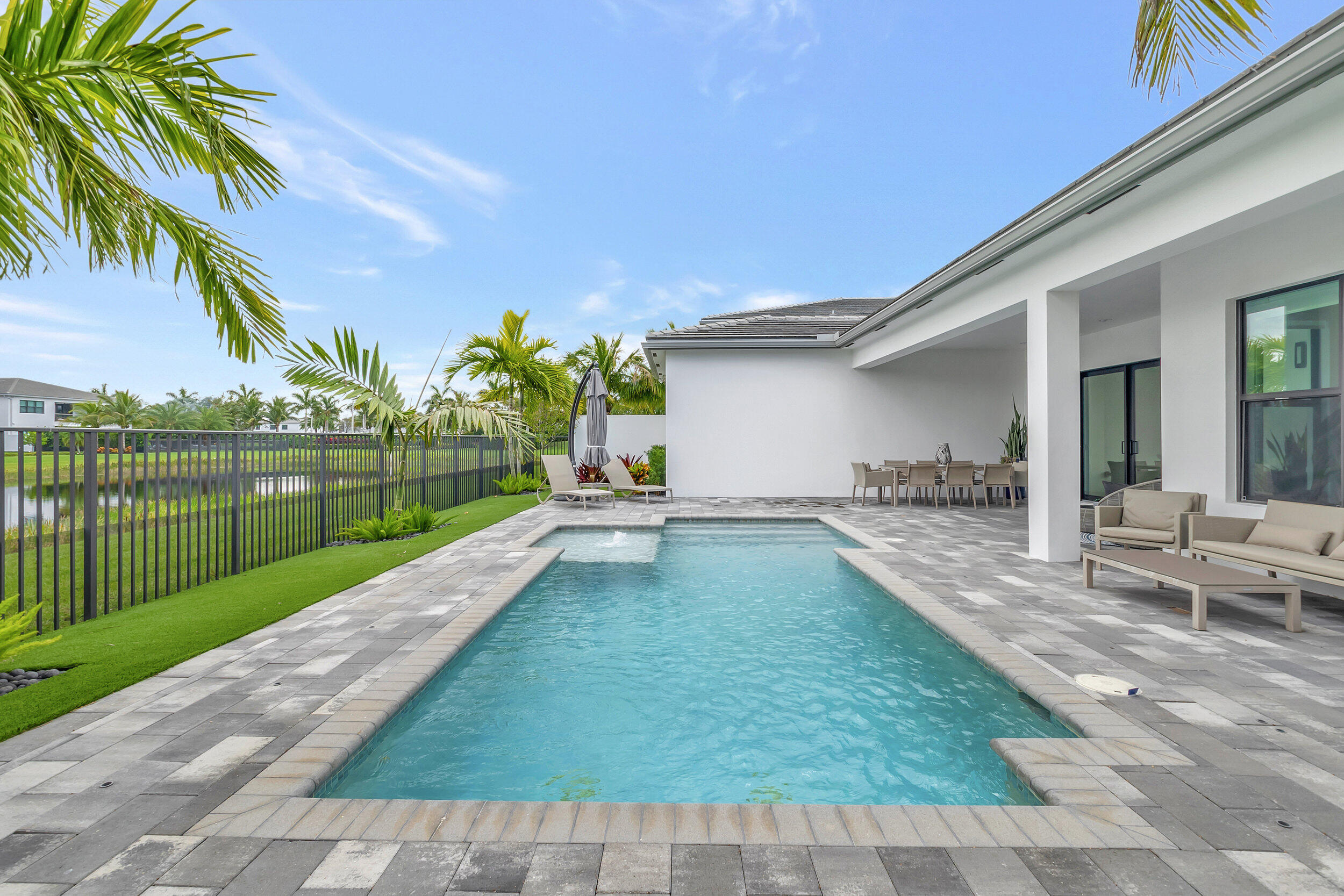 17118 Aquavera Way Boca Raton, FL 33496 - Photo 24 of 53 a view of a backyard with a garden and plants