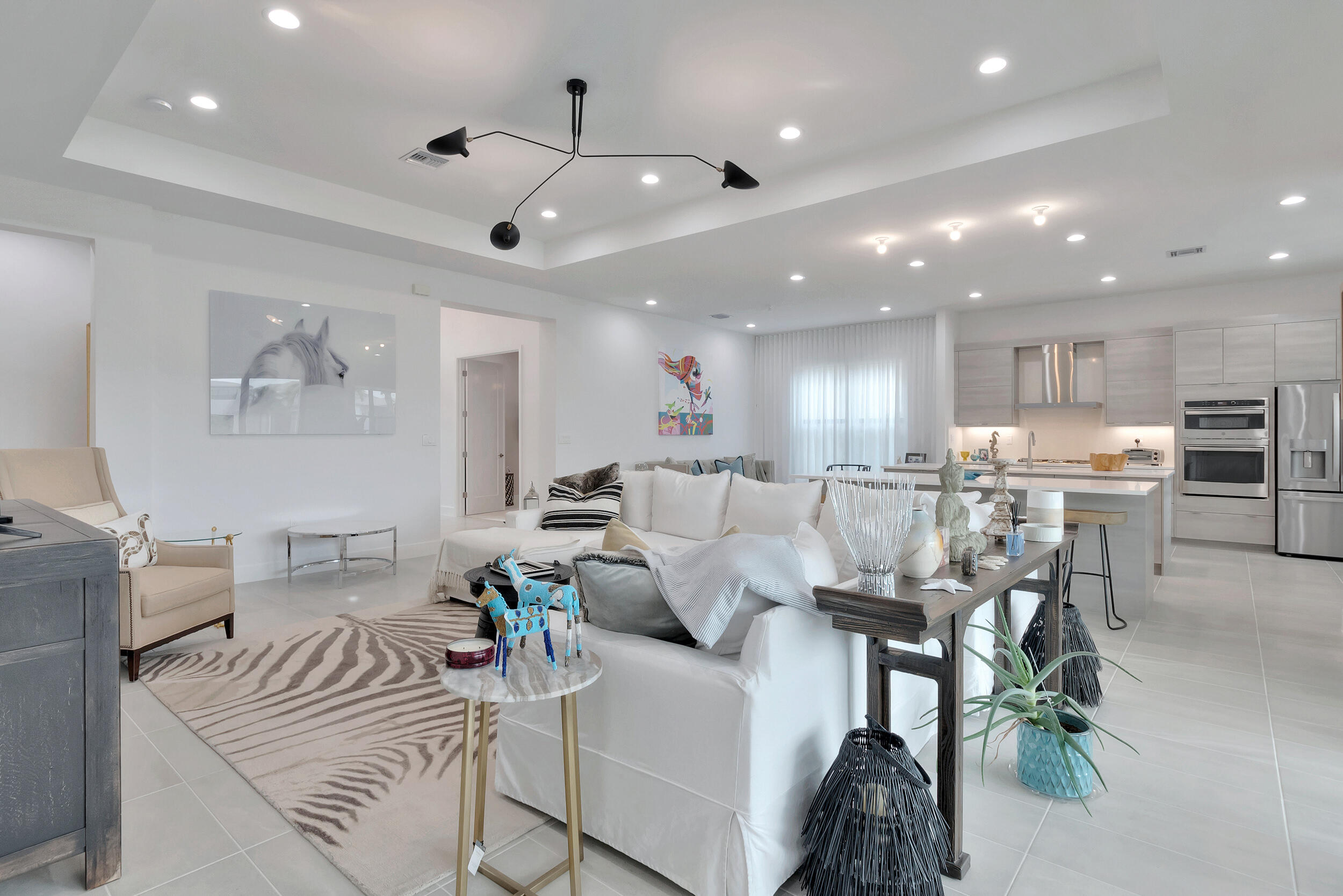 17118 Aquavera Way Boca Raton, FL 33496 - Photo 5 of 53 a living room with furniture and kitchen view