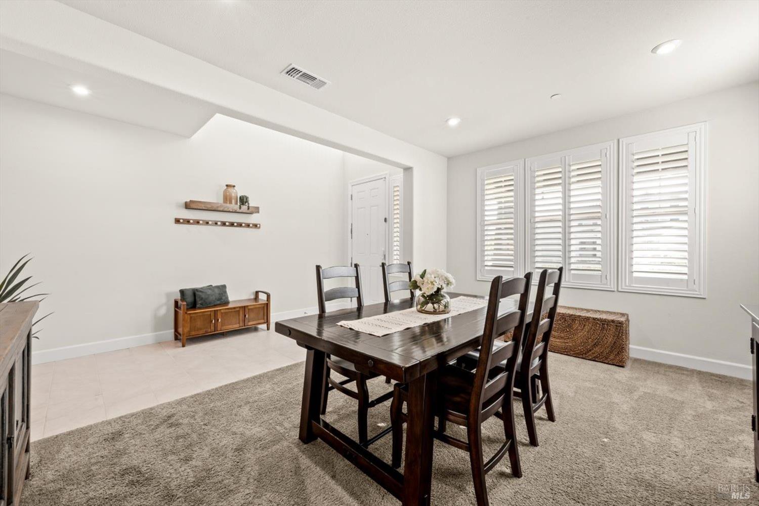 710 Fielding Way Dixon, CA 95620 - Photo 17 of 104 a view of a dining room with furniture and a window