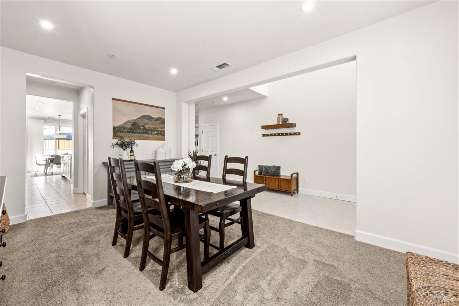 710 Fielding Way Dixon, CA 95620 - Photo 18 of 104 a view of a dining room with furniture