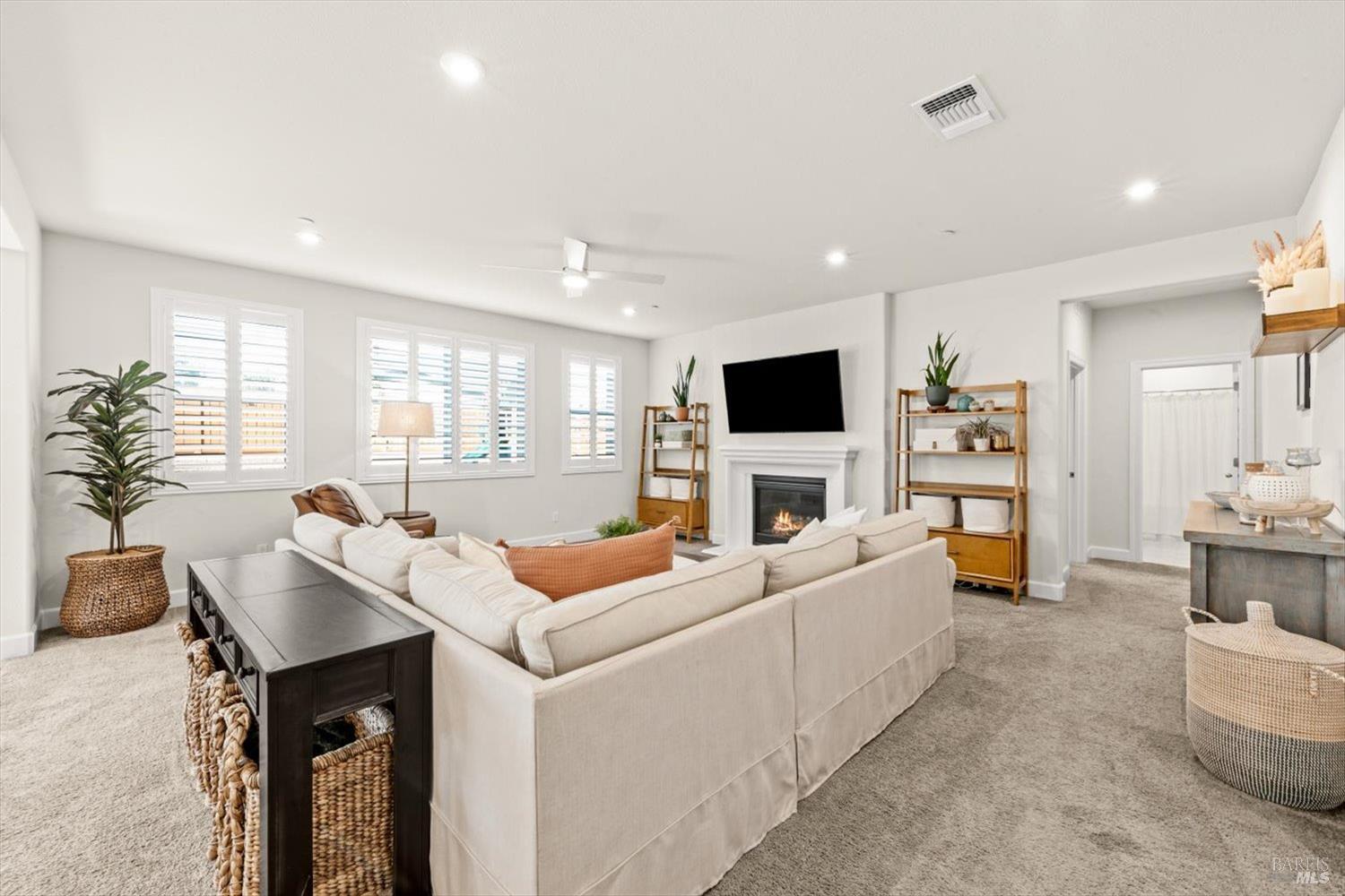 710 Fielding Way Dixon, CA 95620 - Photo 45 of 104 a living room with furniture and a flat screen tv