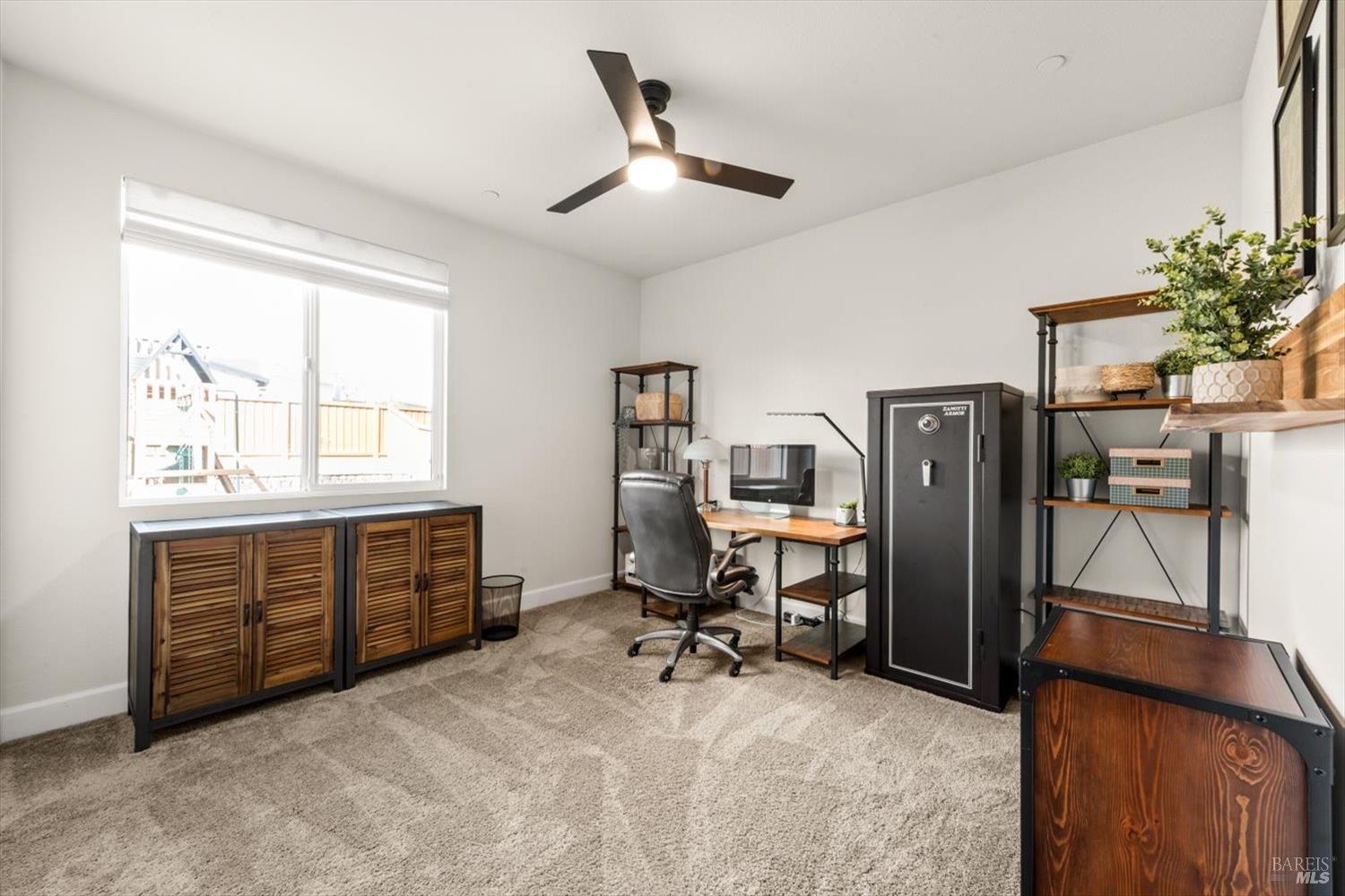 710 Fielding Way Dixon, CA 95620 - Photo 47 of 104 a view of workspace with furniture window and wooden floor