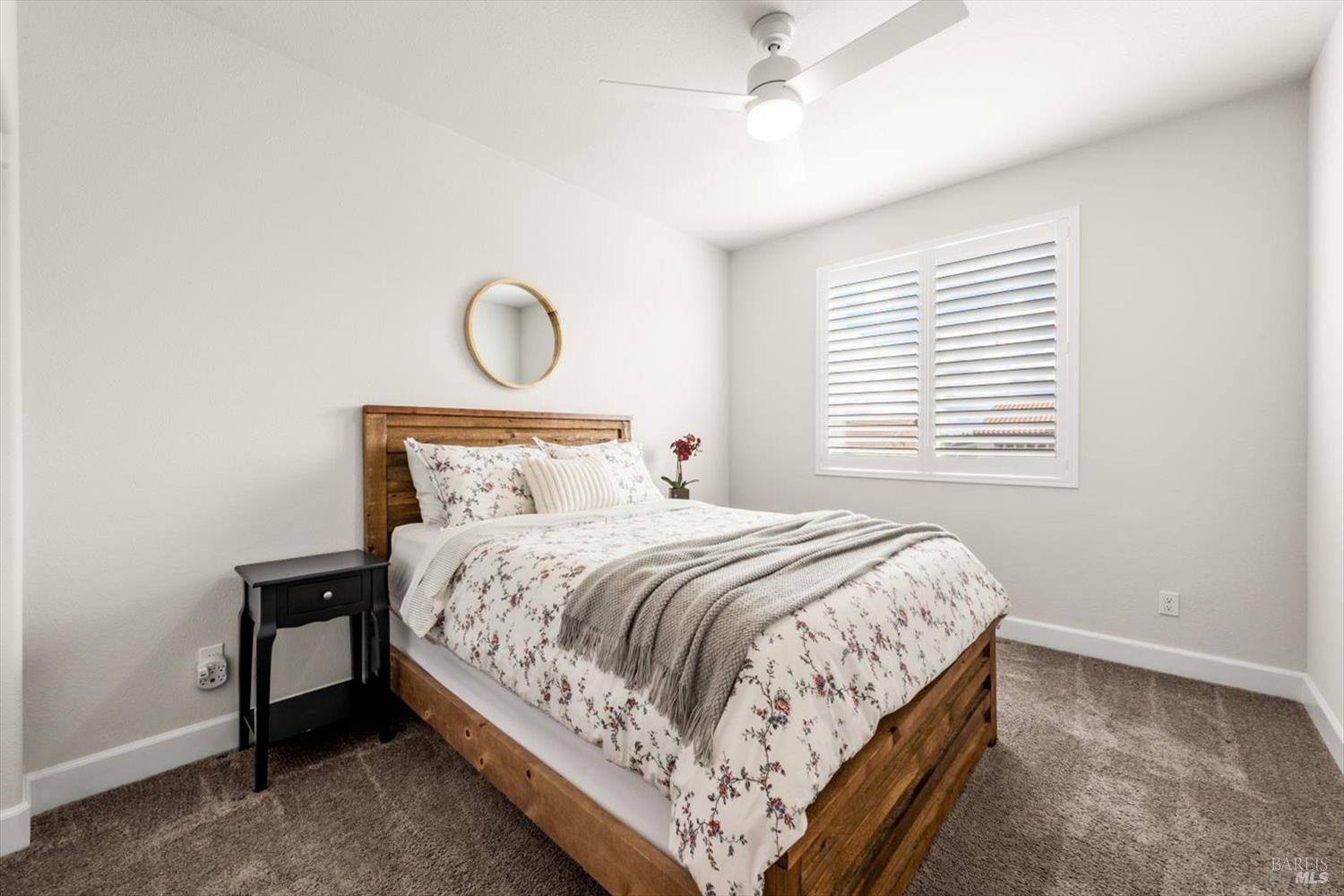 710 Fielding Way Dixon, CA 95620 - Photo 72 of 104 a bedroom with a bed and a window