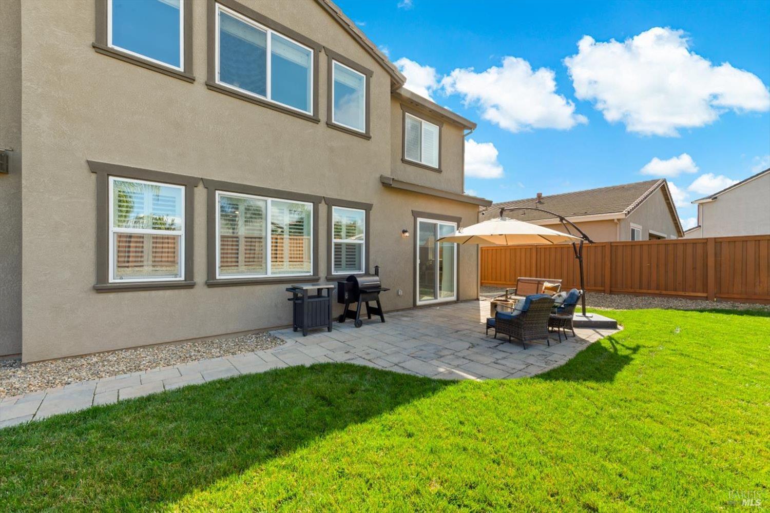710 Fielding Way Dixon, CA 95620 - Photo 84 of 104 a backyard of a house with table and chairs