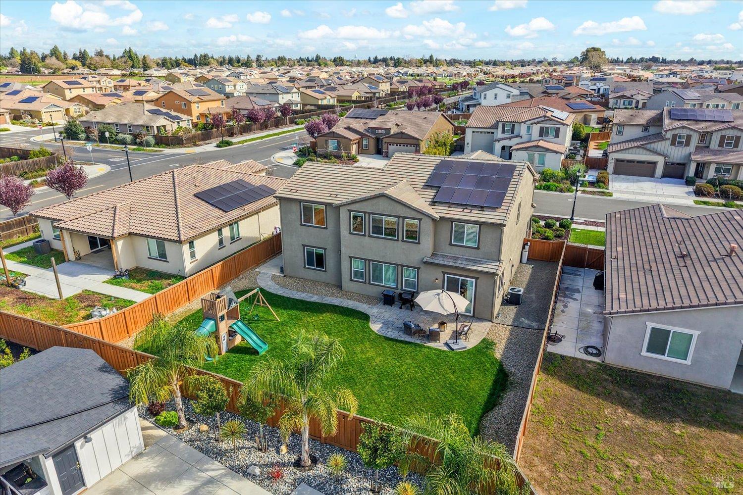 710 Fielding Way Dixon, CA 95620 - Photo 94 of 104 an aerial view of multiple houses with yard