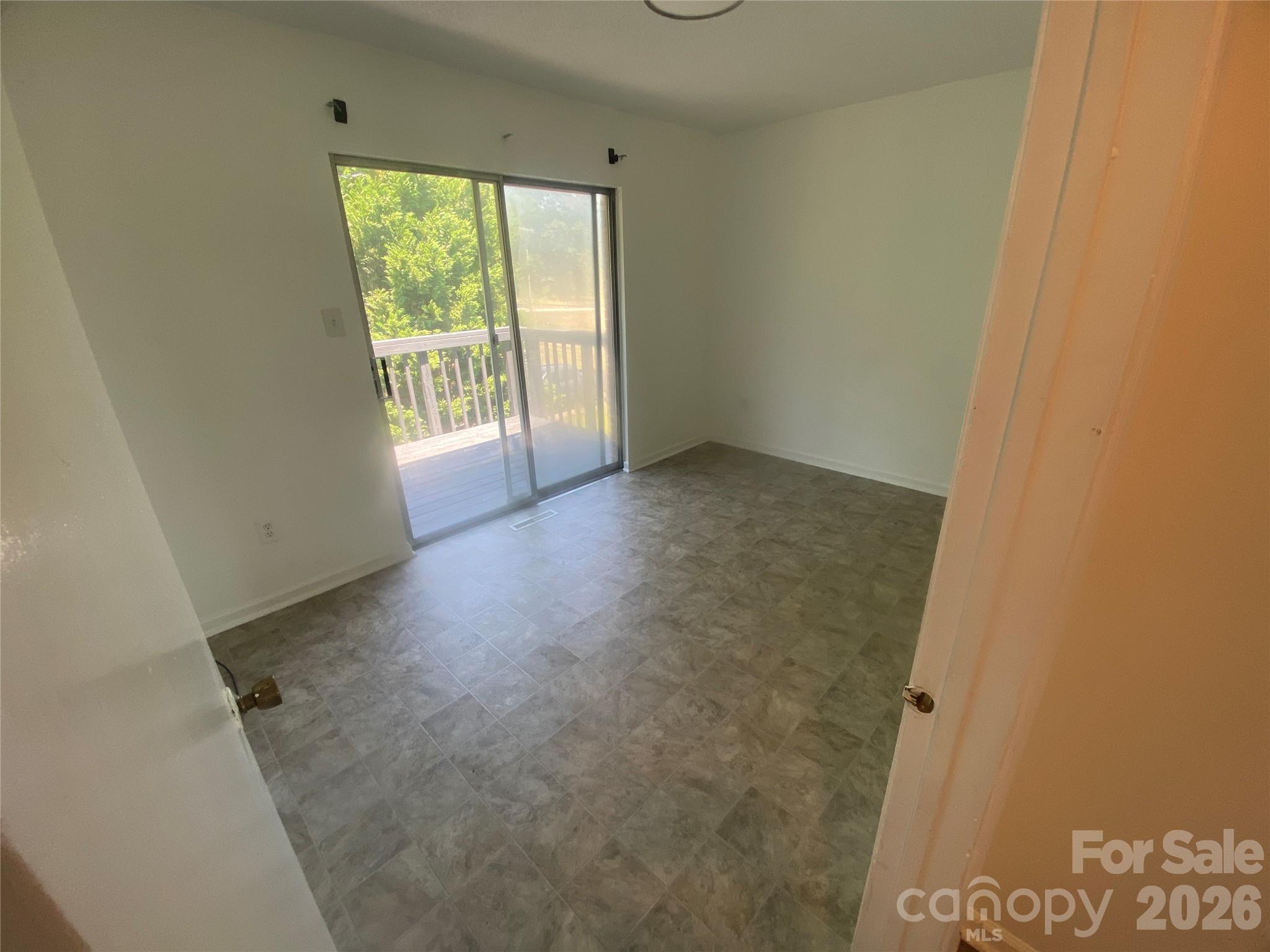 788 Coley Road Salisbury, NC 28146 - Photo 21 of 43 an empty room with a window