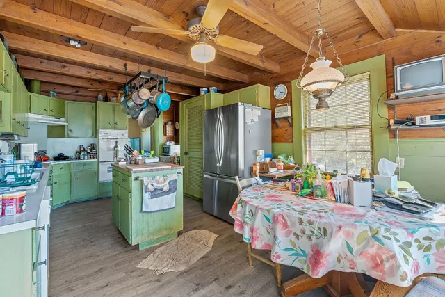 a bedroom with a bed and a table