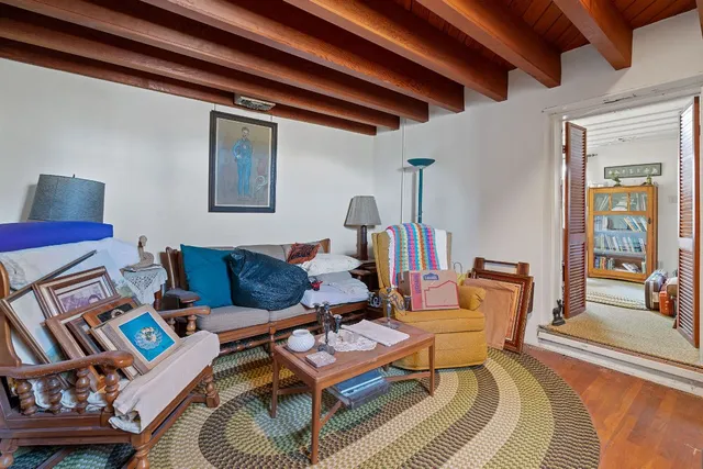 a living room with furniture and a couch