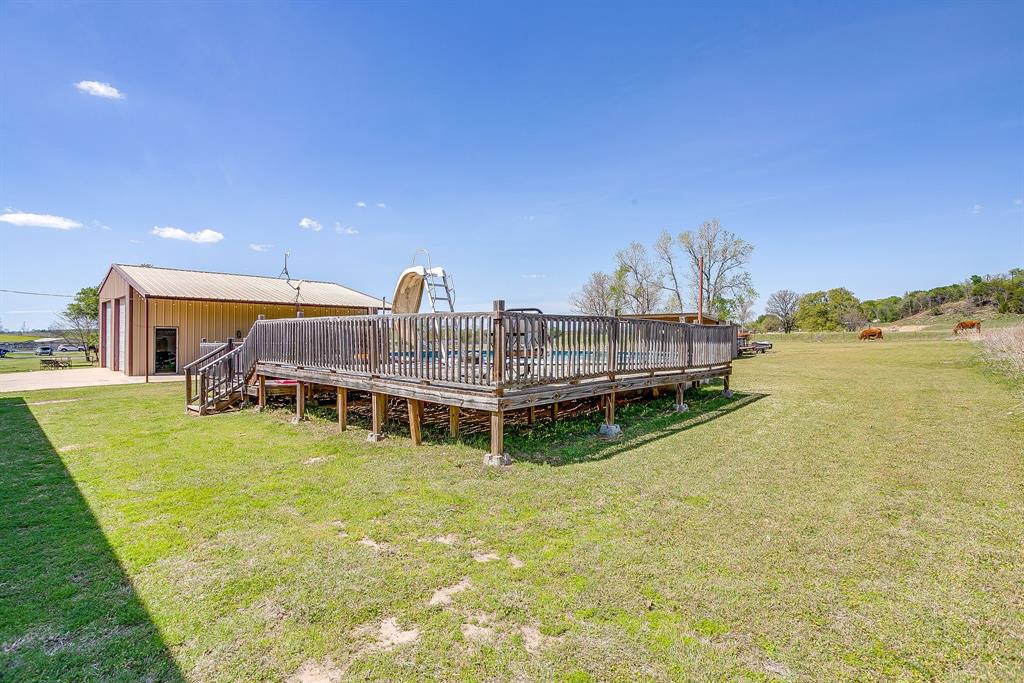 321 Young Road Millsap, TX 76066 - Photo 26 of 28 a view of a swimming pool with seating space