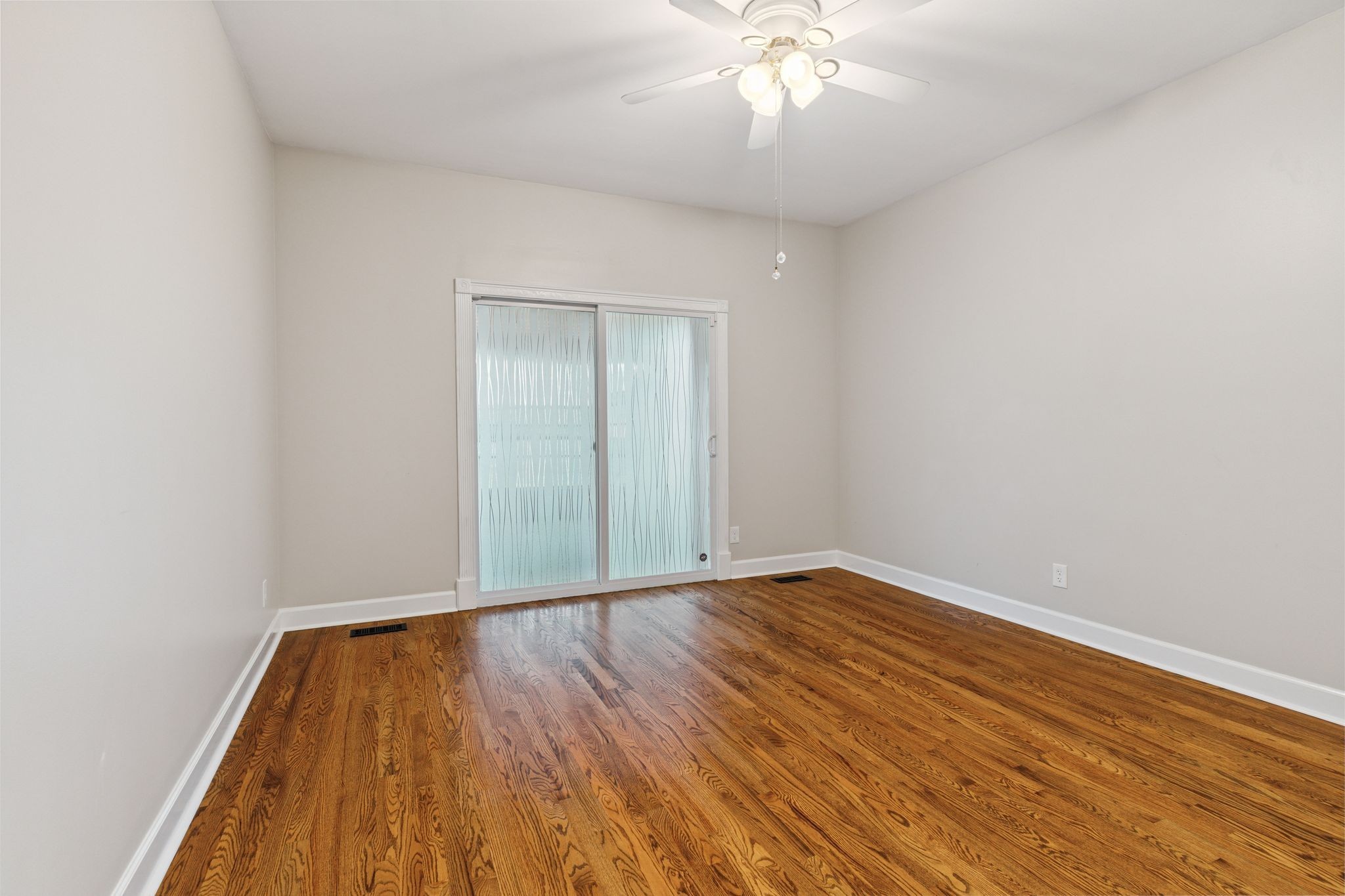 2105 Chels Way Old Hickory, TN 37138 - Photo 22 of 47 an empty room with wooden floor and chandelier fan