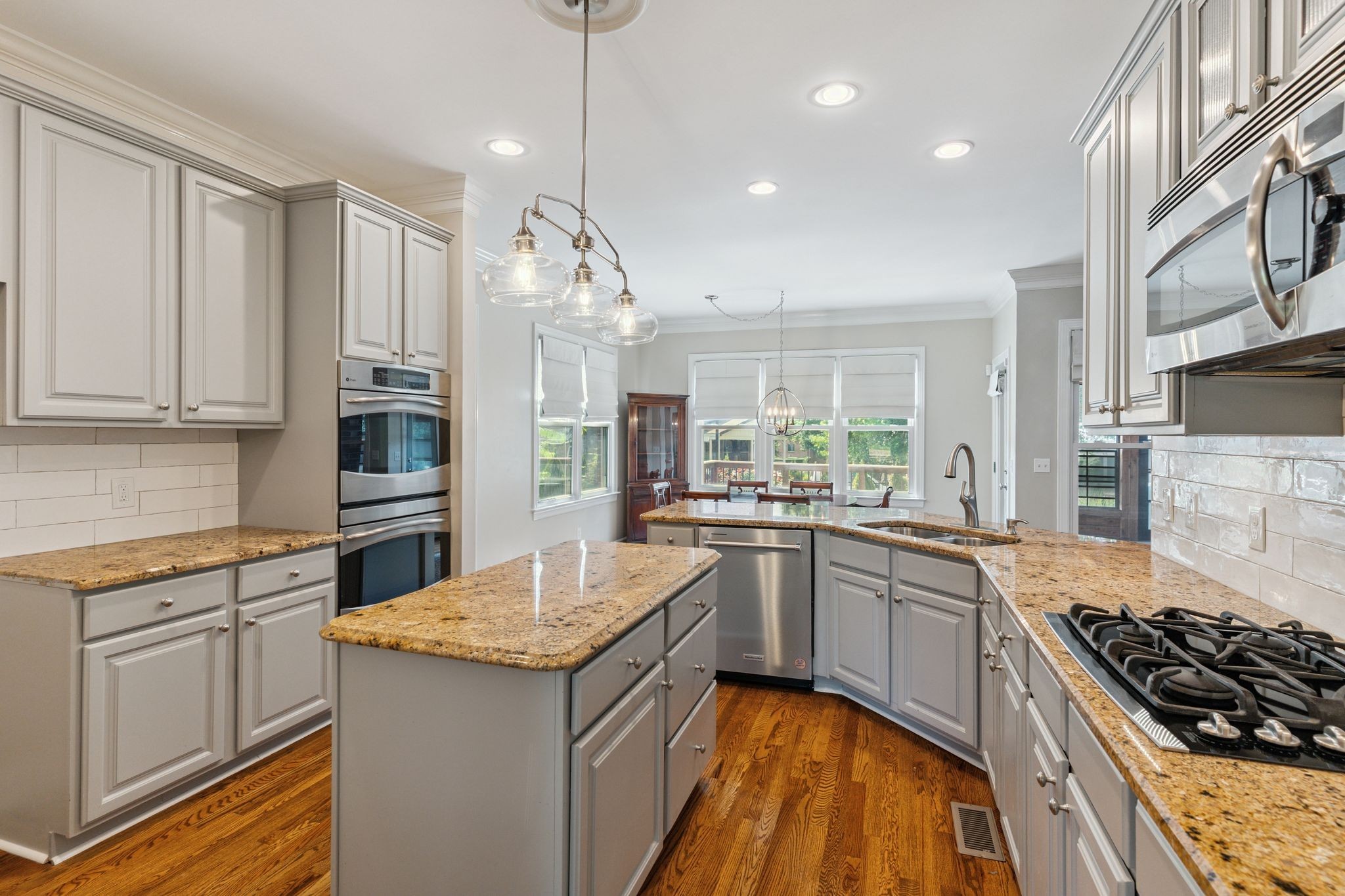 2105 Chels Way Old Hickory, TN 37138 - Photo 3 of 47 a kitchen with stainless steel appliances granite countertop a stove and a sink