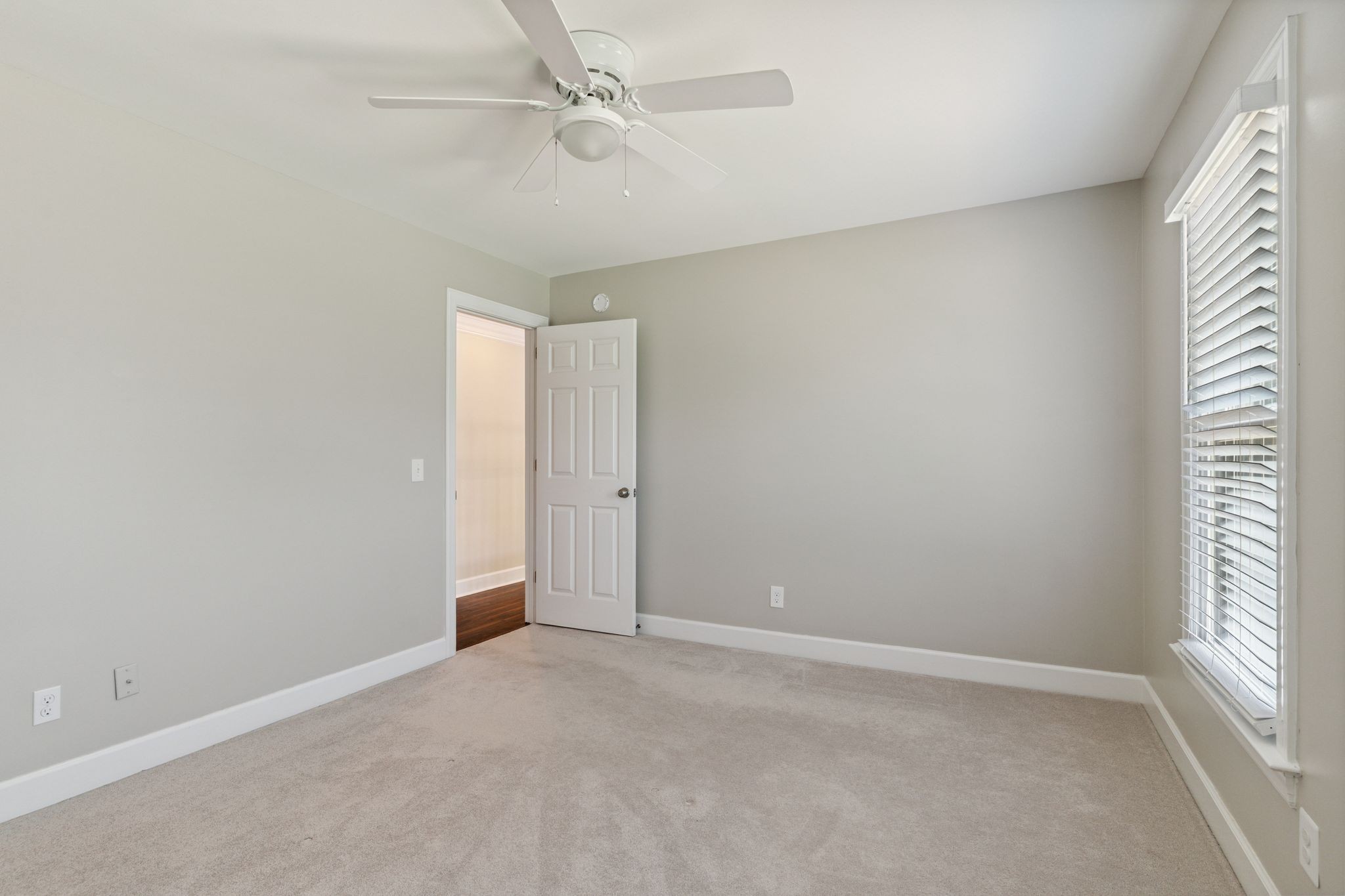 2105 Chels Way Old Hickory, TN 37138 - Photo 32 of 47 an empty room with a window and a fan