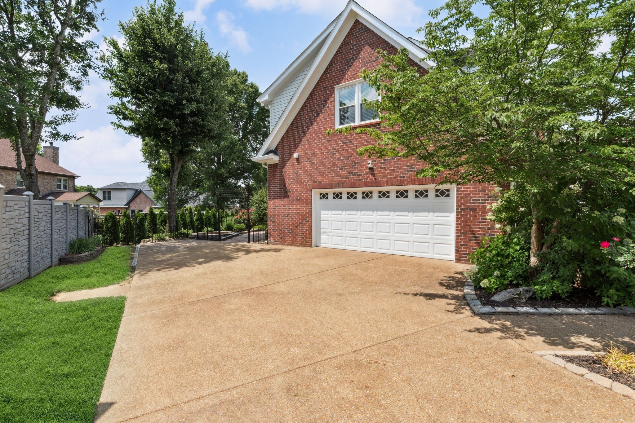 2105 Chels Way Old Hickory, TN 37138 - Photo 41 of 47 a front view of a house with a yard and garage