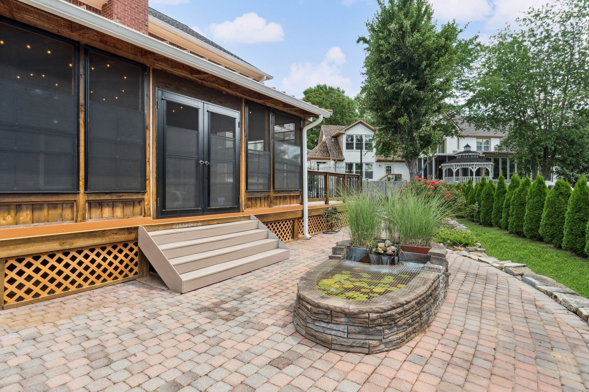 2105 Chels Way Old Hickory, TN 37138 - Photo 45 of 47 a view of a patio with couches table and chairs and potted plants