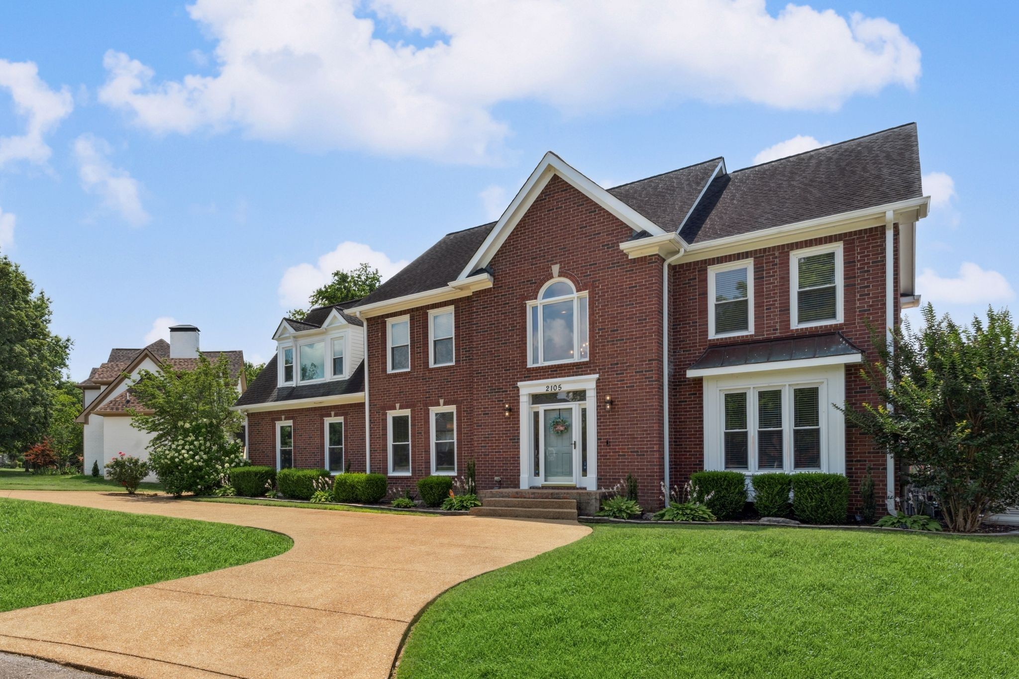 2105 Chels Way Old Hickory, TN 37138 - Photo 8 of 47 front view of a brick house with a yard