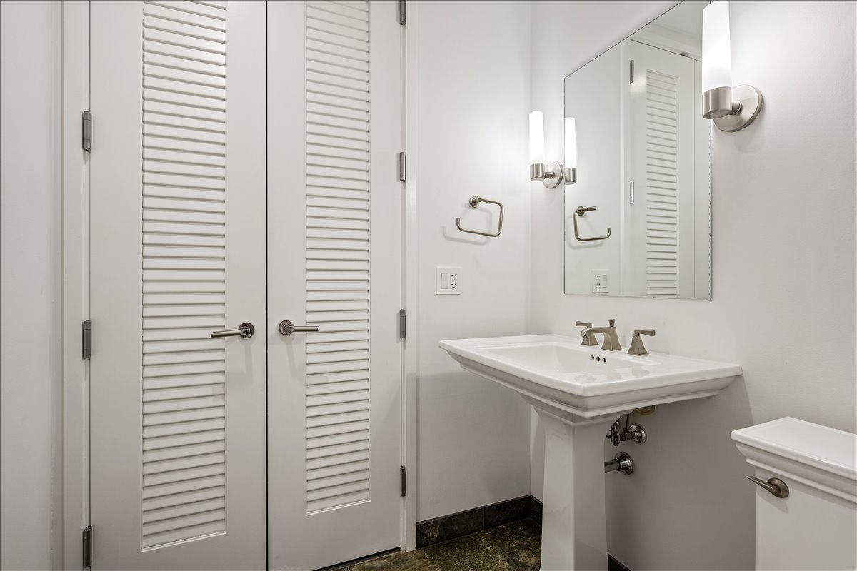 401 North Wabash Avenue, Unit 67F Chicago, IL 60611 - Photo 15 of 44 a bathroom with a sink a toilet and shower