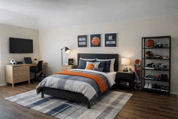 a bedroom with a bed and wooden floor