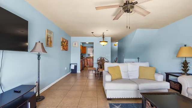 a kitchen with stainless steel appliances granite countertop a stove sink and cabinets
