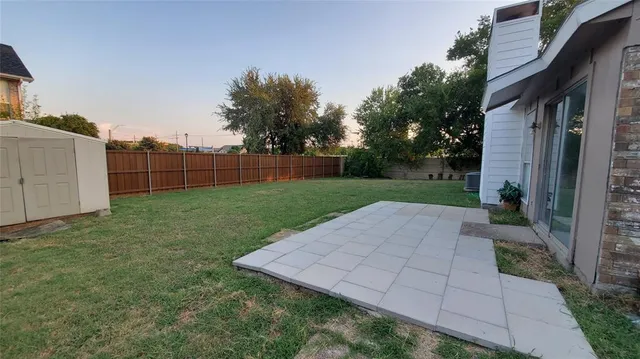 a view of a backyard with a garden