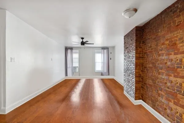 a view of an empty room and window