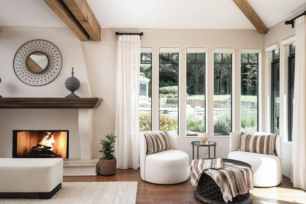 840 Ivy Lane Montecito, CA 93108 - Photo 16 of 57 a living room with furniture and a fireplace