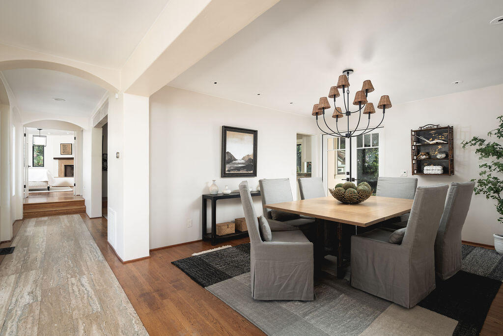 840 Ivy Lane Montecito, CA 93108 - Photo 21 of 57 a view of a dining room with furniture and wooden floor