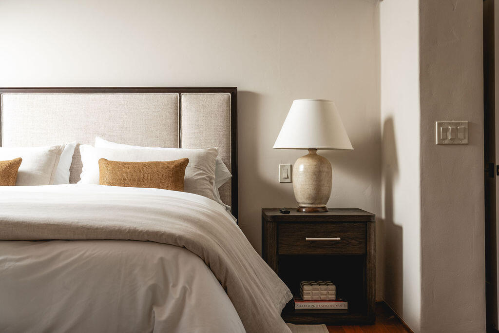 840 Ivy Lane Montecito, CA 93108 - Photo 41 of 57 a bedroom with a bed and a lamp on table