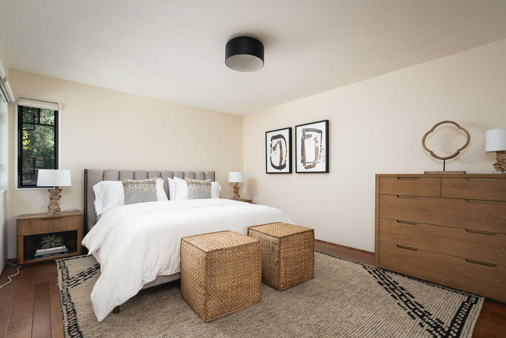 840 Ivy Lane Montecito, CA 93108 - Photo 43 of 57 a bedroom with a bed and lamp