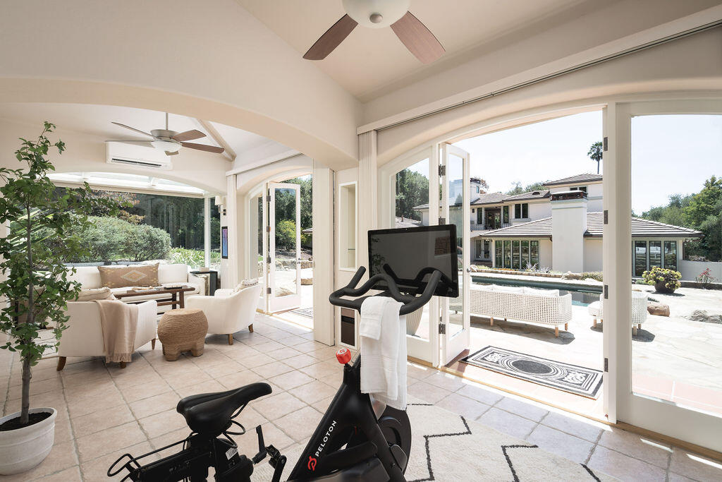 840 Ivy Lane Montecito, CA 93108 - Photo 52 of 57 a work room with furniture a rug potted plant and a large window