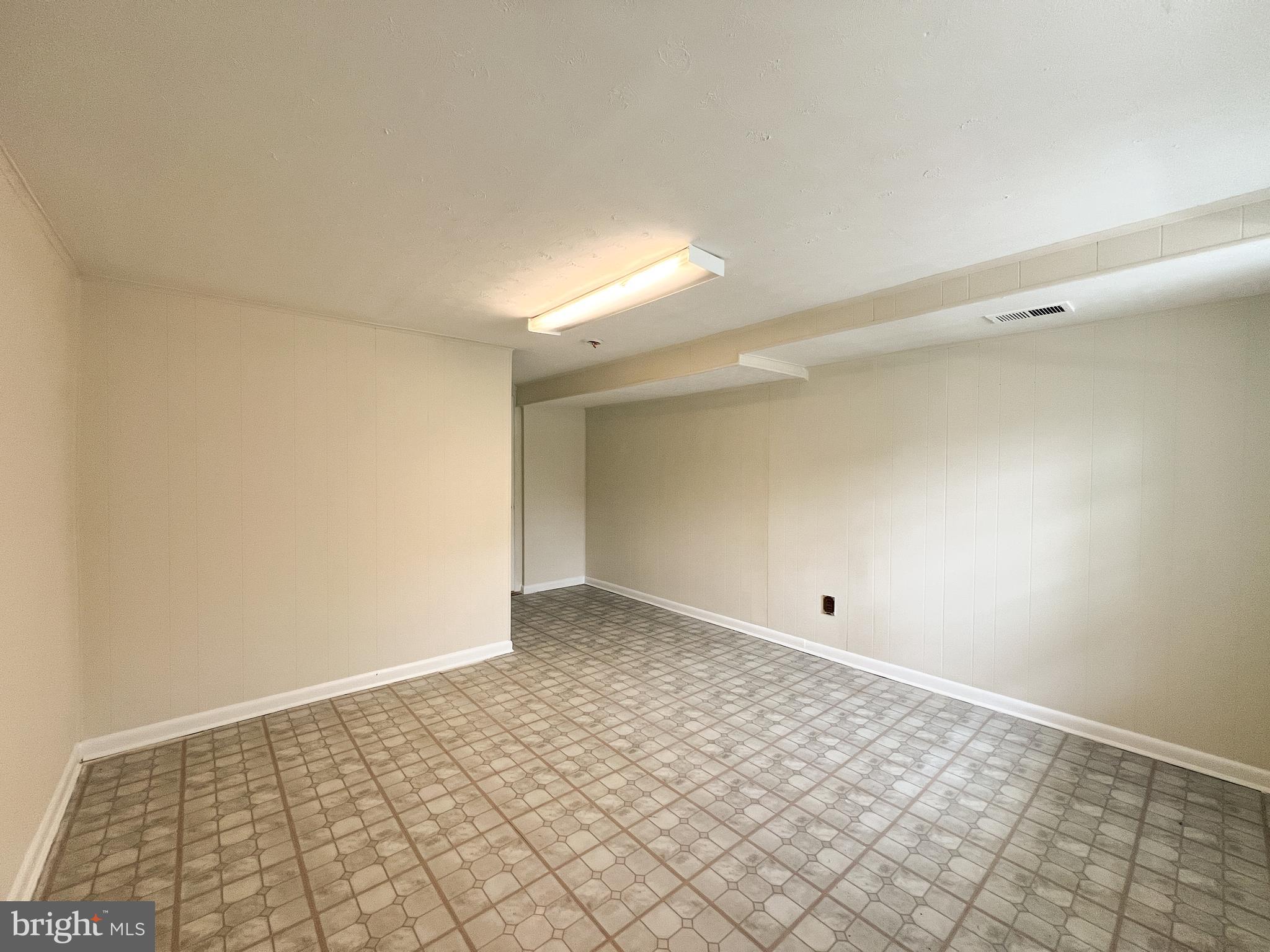 10209 Douglas Avenue Silver Spring, MD 20902 - Photo 13 of 22 a view of an empty room