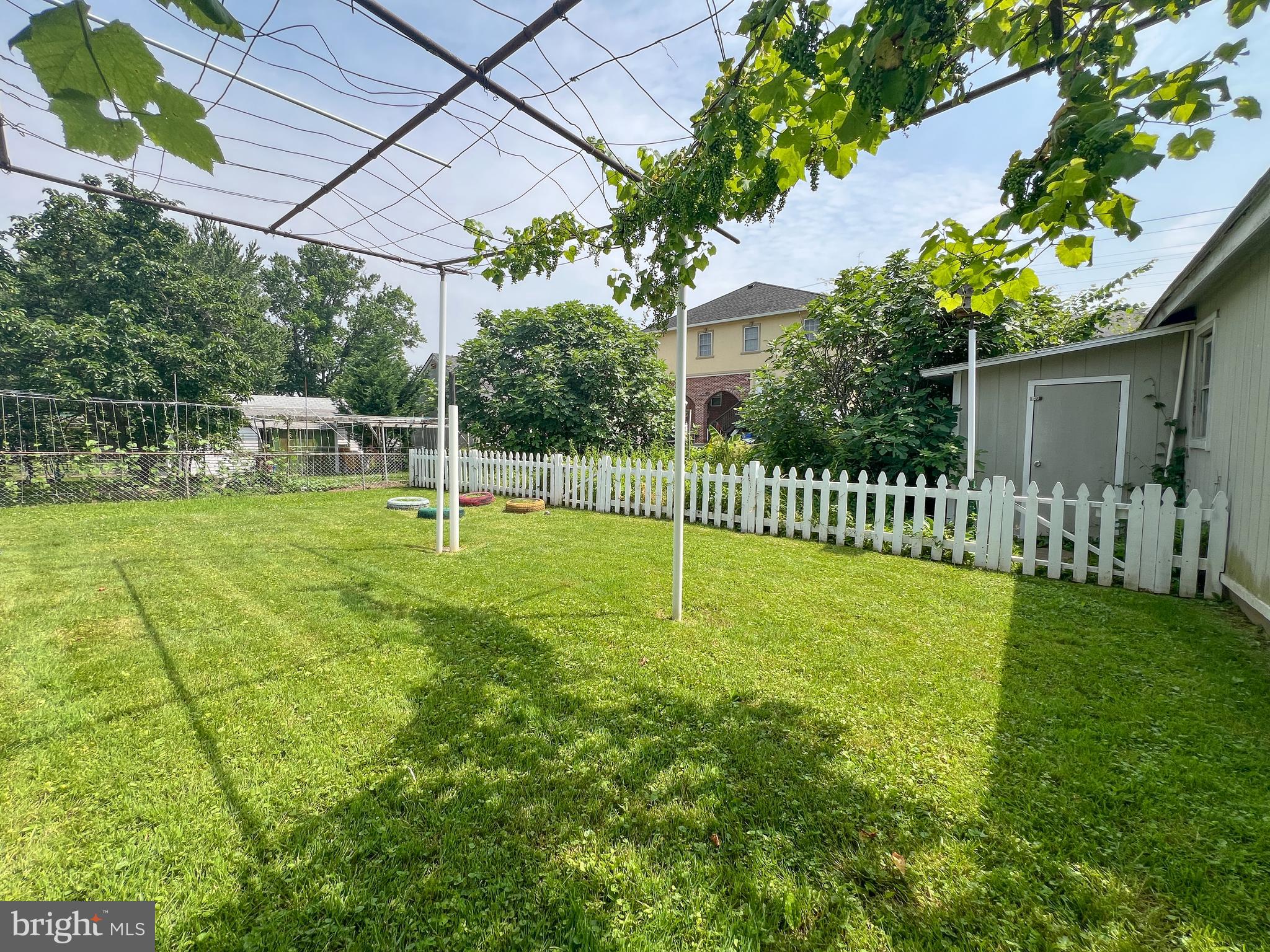 10209 Douglas Avenue Silver Spring, MD 20902 - Photo 22 of 22 a view of a house with a backyard