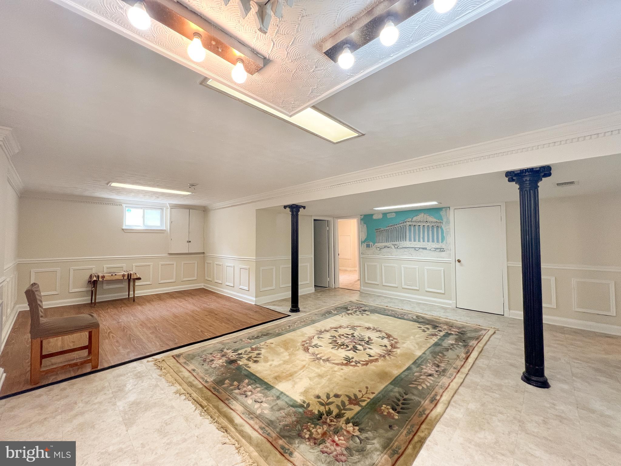 10209 Douglas Avenue Silver Spring, MD 20902 - Photo 5 of 22 a view of a bedroom with wooden floor and windows