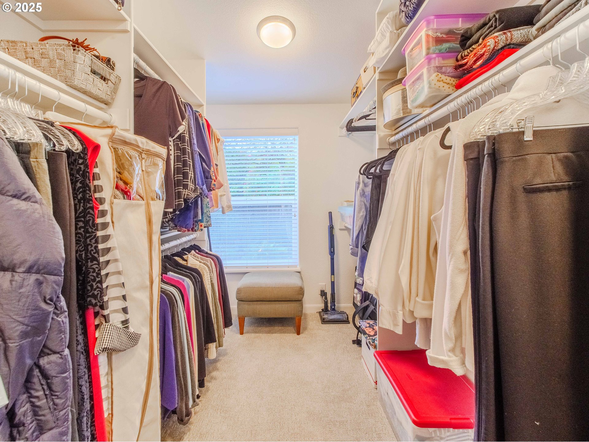 17572 Northwest Shady Fir Loop, Unit 24 Beaverton, OR 97006 - Photo 20 of 31 a view of walk in closet with clothes and shoes