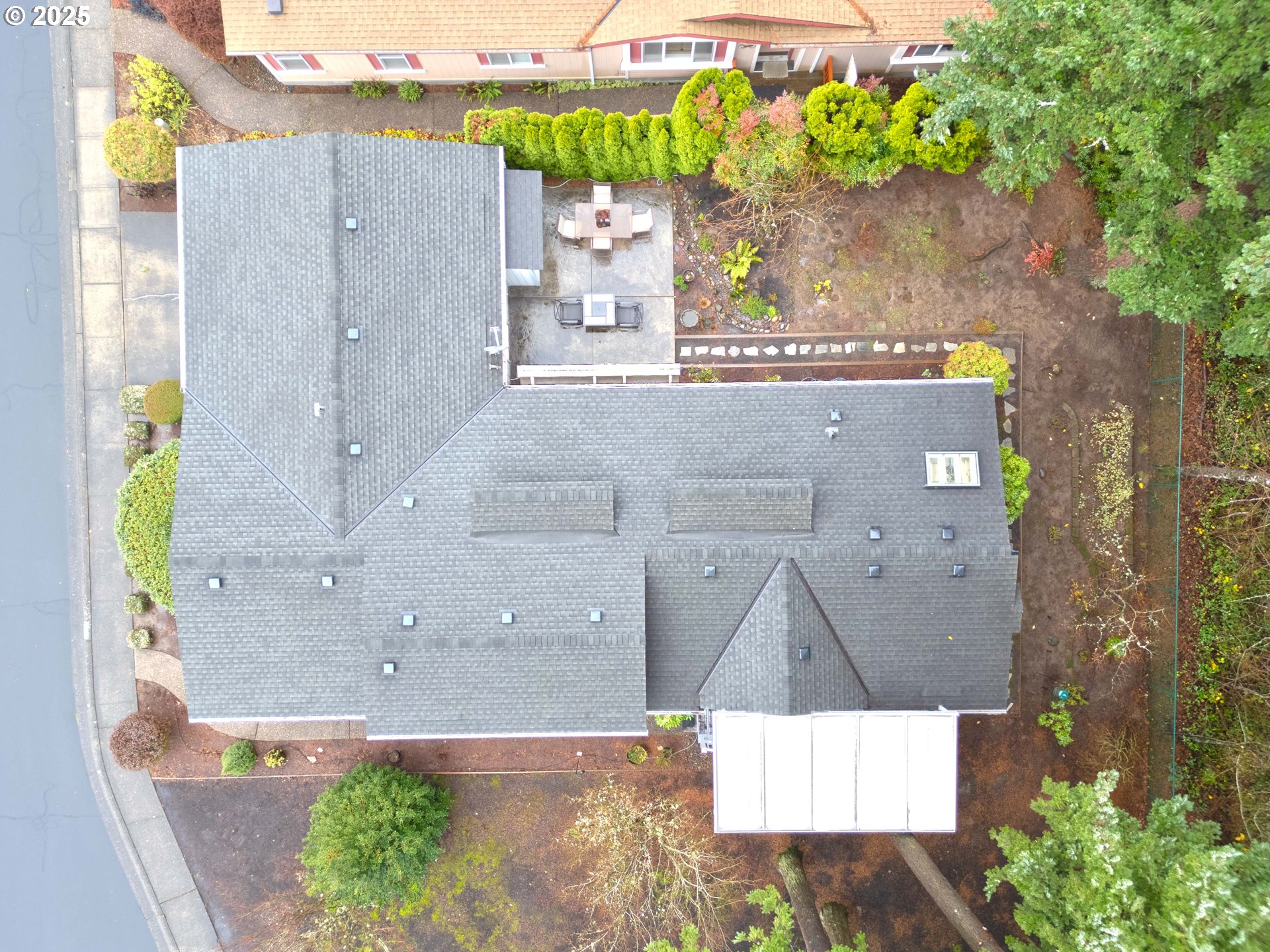 17572 Northwest Shady Fir Loop, Unit 24 Beaverton, OR 97006 - Photo 31 of 31 an aerial view of a house with a yard
