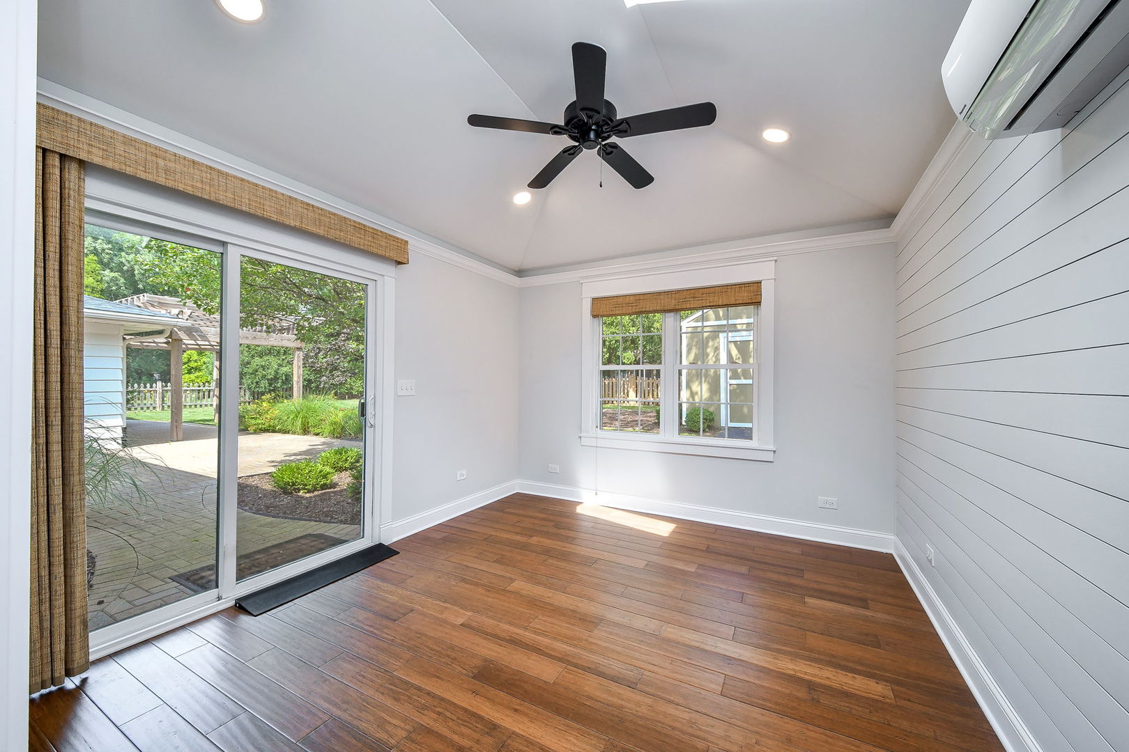 1845 Howard Street Wheaton, IL 60187 - Photo 15 of 29 a view of an empty room with wooden floor and a window
