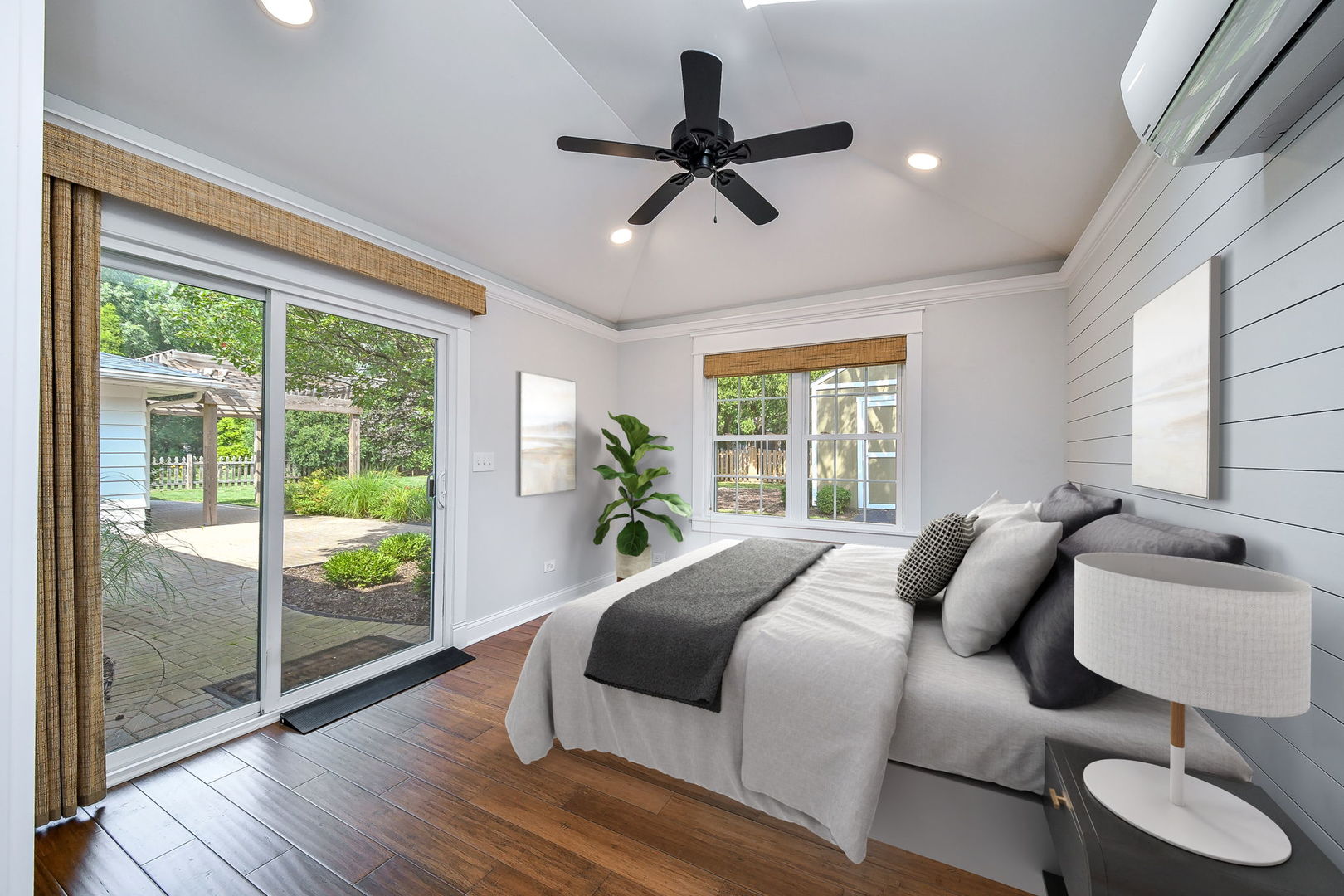 1845 Howard Street Wheaton, IL 60187 - Photo 16 of 29 a bedroom with a large bed and a window