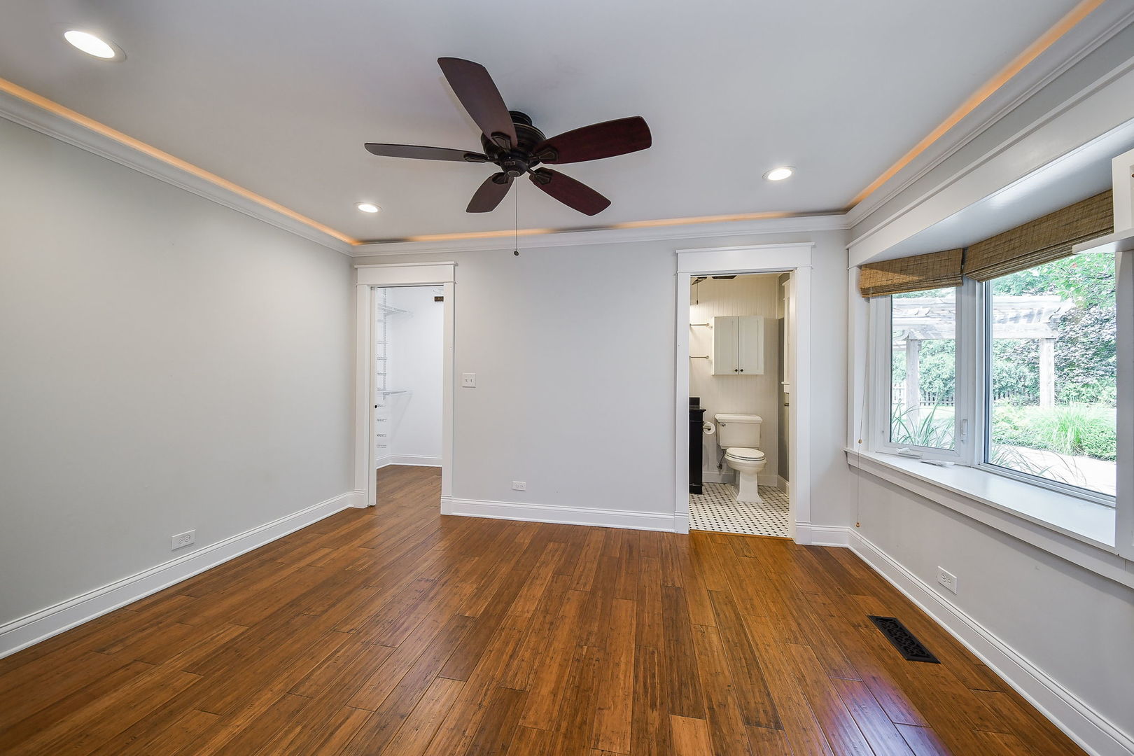 1845 Howard Street Wheaton, IL 60187 - Photo 18 of 29 a view of empty room with wooden floor and fan