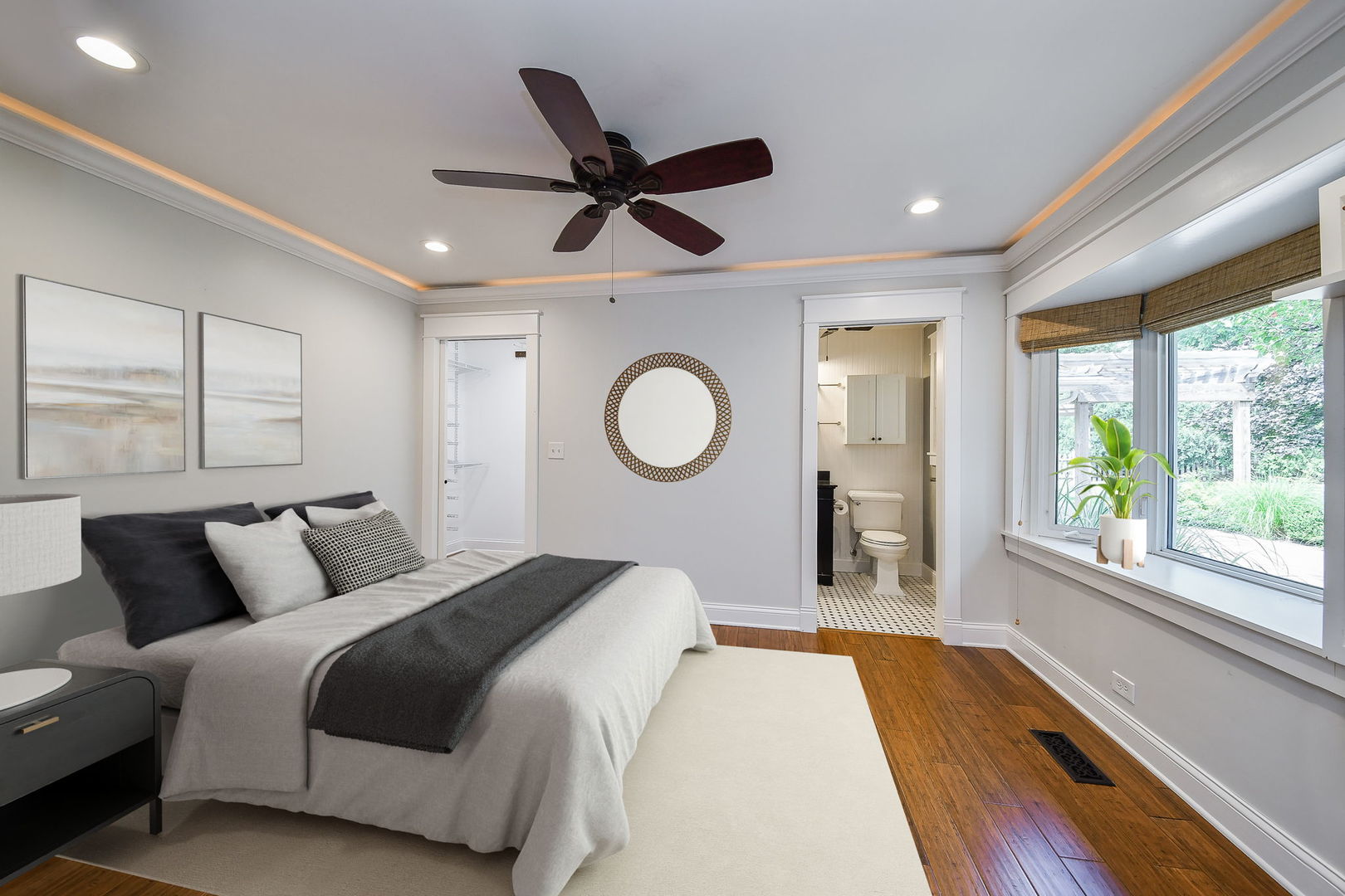 1845 Howard Street Wheaton, IL 60187 - Photo 20 of 29 a bedroom with a large bed and a large window