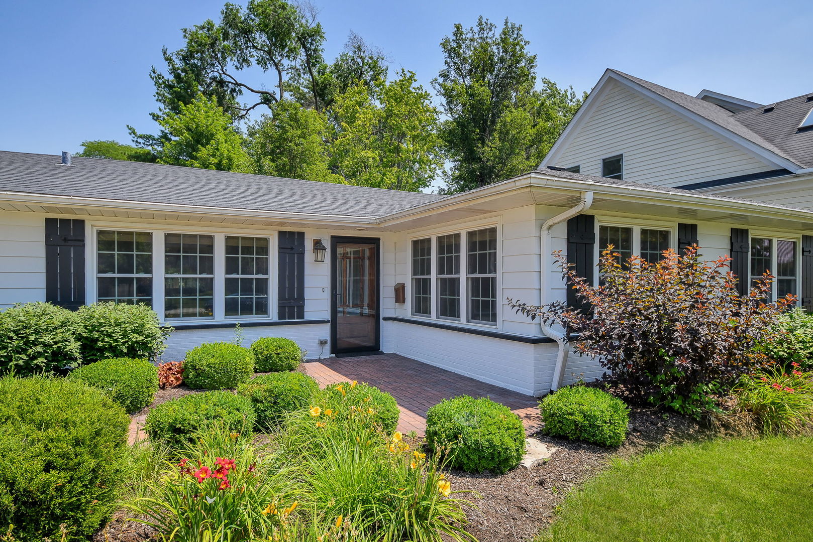 1845 Howard Street Wheaton, IL 60187 - Photo 2 of 29 front view of a house with a yard