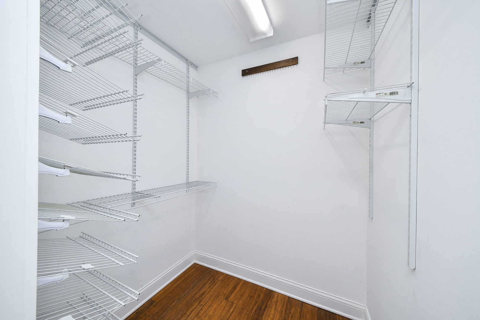 1845 Howard Street Wheaton, IL 60187 - Photo 21 of 29 a view of a room with racks on the wall