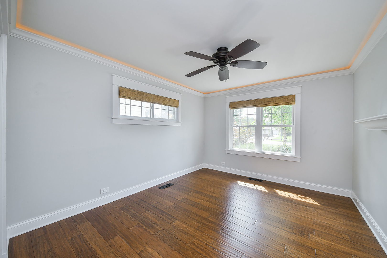 1845 Howard Street Wheaton, IL 60187 - Photo 23 of 29 a view of empty room with wooden floor and fan