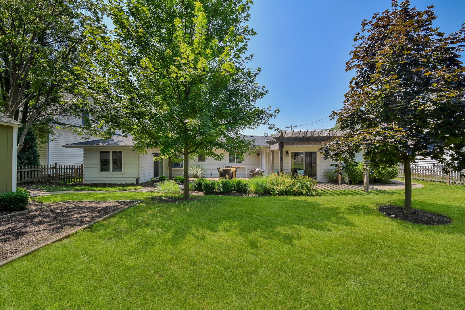 1845 Howard Street Wheaton, IL 60187 - Photo 29 of 29 a view of a house with a yard