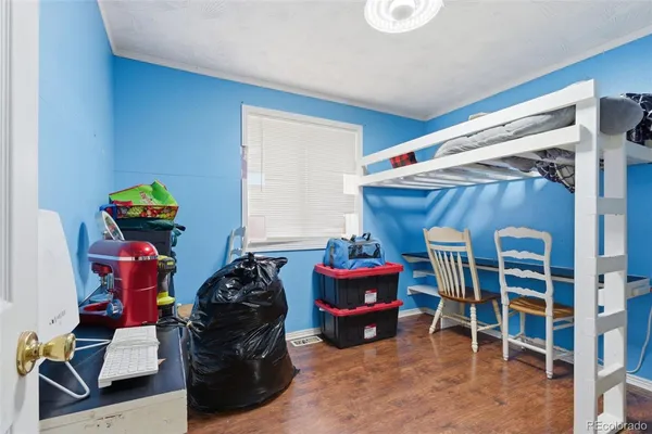 a garage with a chair and a fireplace